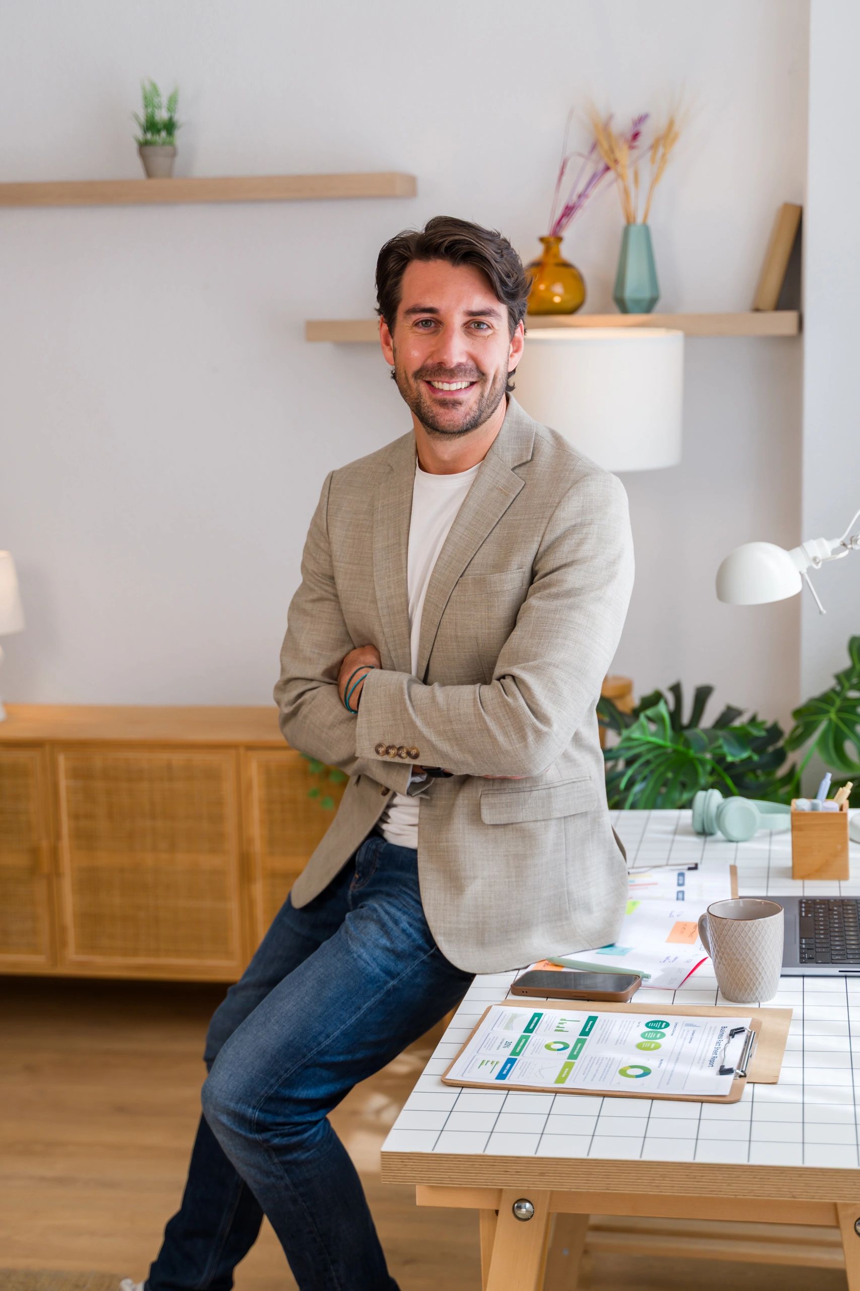 Professional smiling at a modern desk