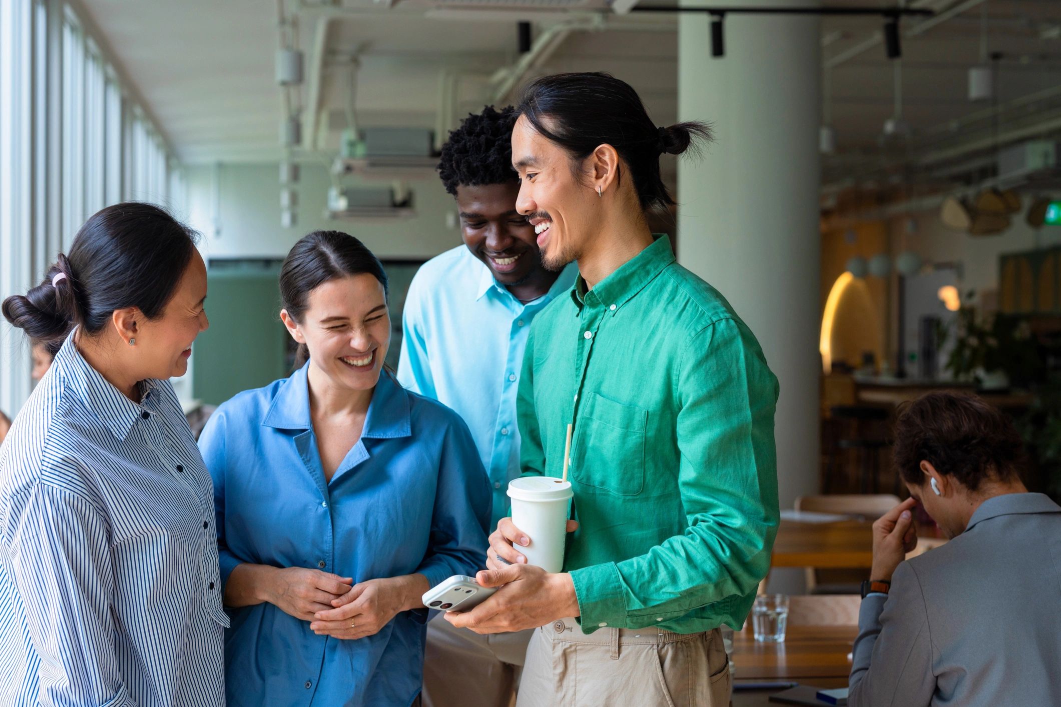 Team members collaborating around a table